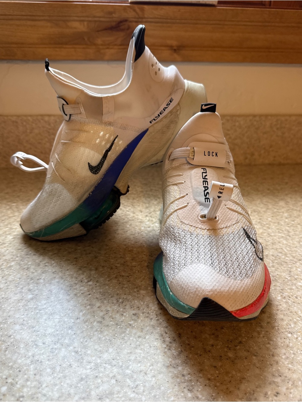 Nike FlyEase White Running Shoes with Teal, Blue and Red Accents